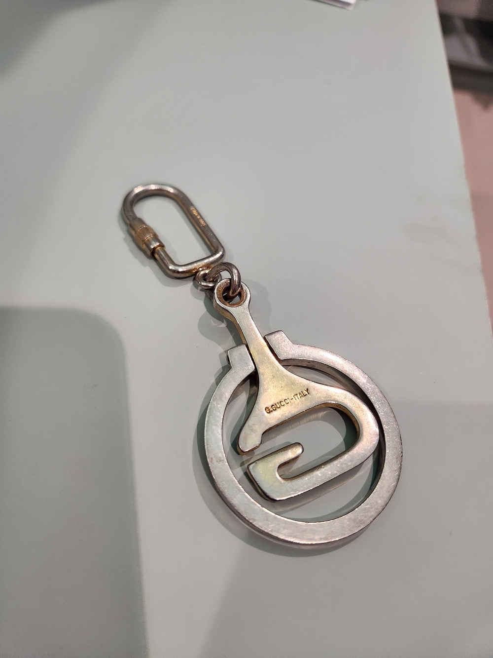 Gucci Two-Tone Silver and Gold G Logo Keychain - Picture 3 of 5